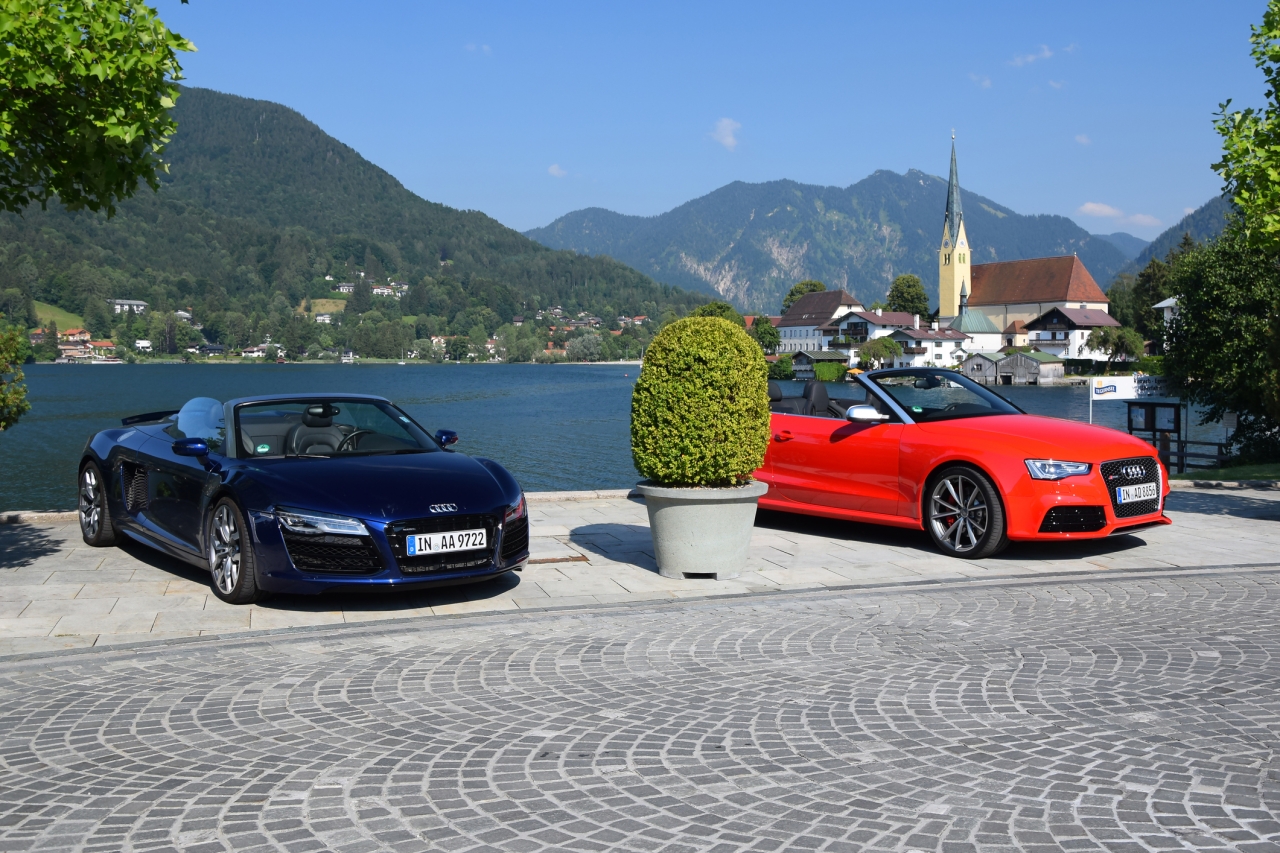 Audi R8 Spyder (granatowy) i A5/RS5 Cabriolet (czerwony) – przykłady aut, w których oryginalne części z drugiej ręki zachowują fabryczną jakość