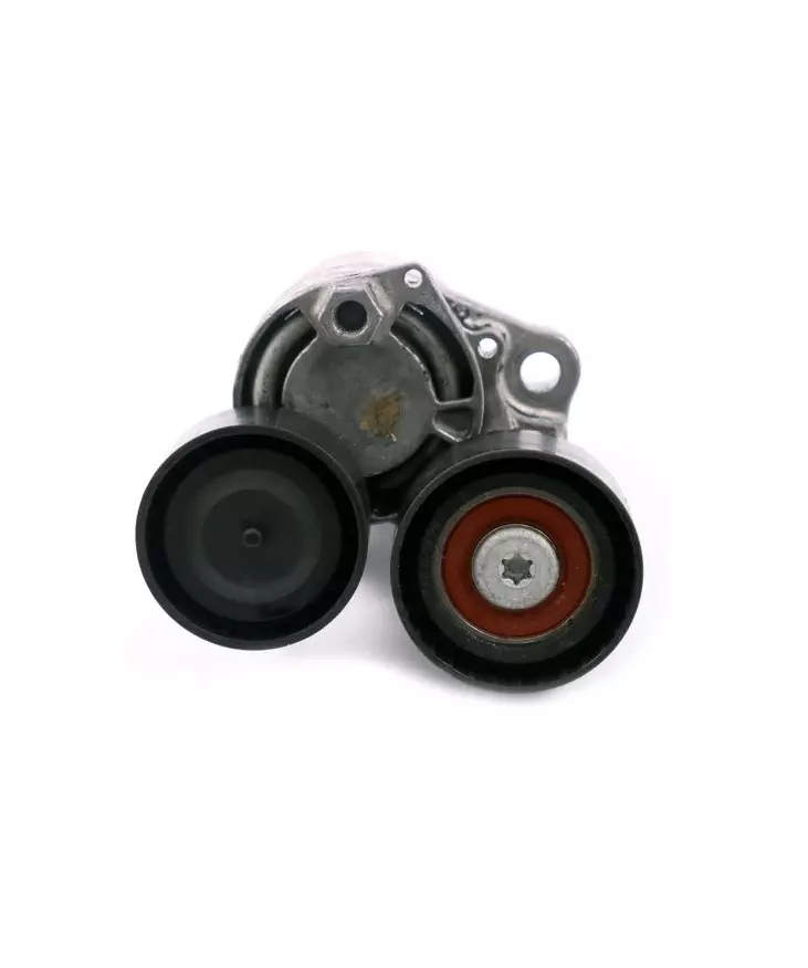 Tensioners and rollers for smooth timing system operation